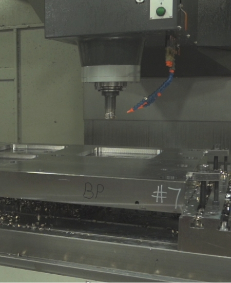 Vertical finish machining on a stainless mold base plate